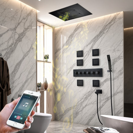 TULUM 32-inch matte black LED music shower system in a luxury bathroom